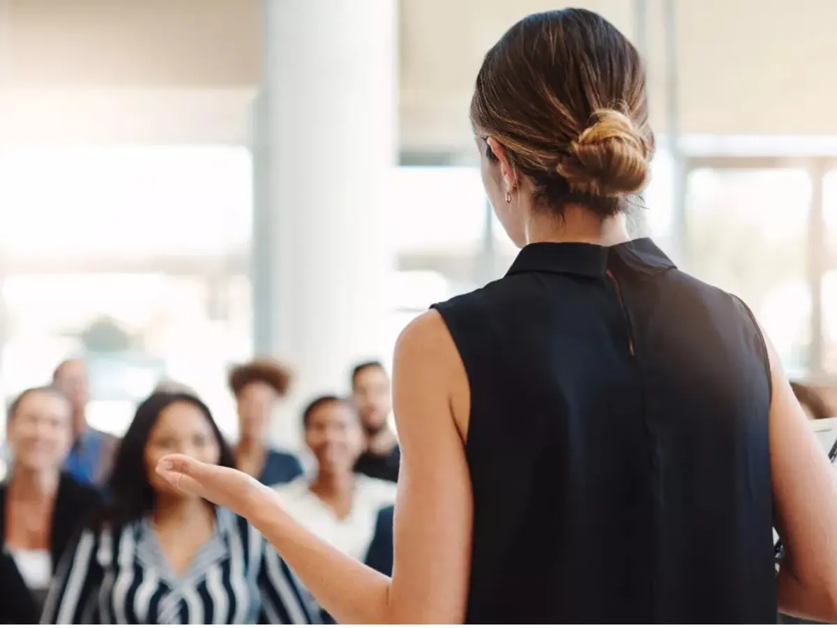 A diverse group of professionals attending an AIM short course session